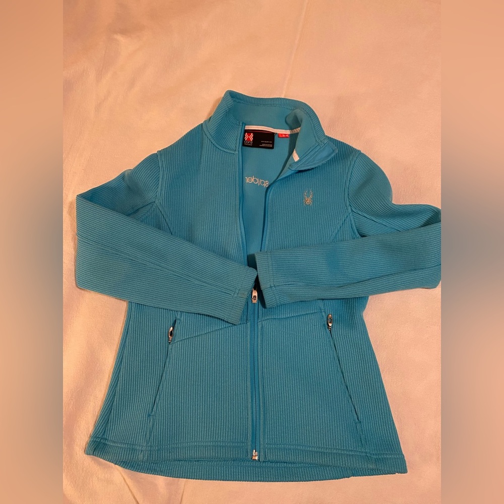Woman’s Spyder Core Sweater jacket.   Size Medium.   Aqua colored
